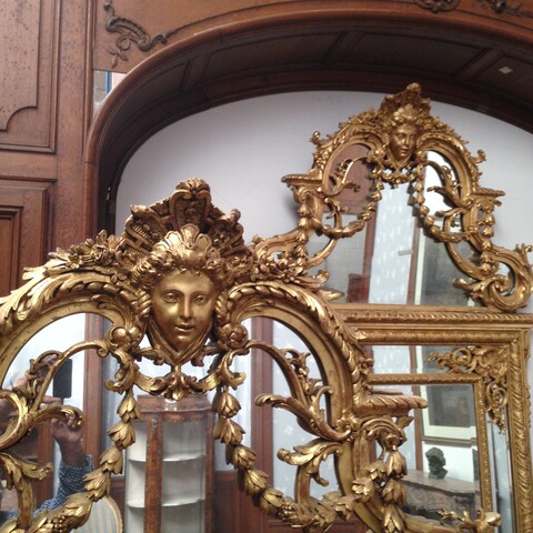 paire de miroirs à pare closes de style Louis XIV en bois doré . XIX siècle .