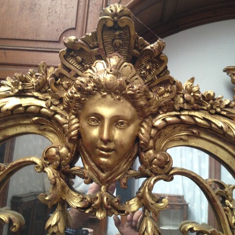 paire de miroirs à pare closes de style Louis XIV en bois doré . XIX siècle .