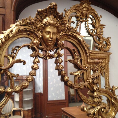 paire de miroirs à pare closes de style Louis XIV en bois doré . XIX siècle .
