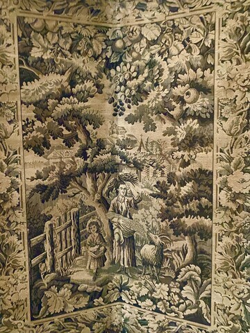 Paravent a quatre feuilles en tapisserie à décor de paysages animés .XX siècle.