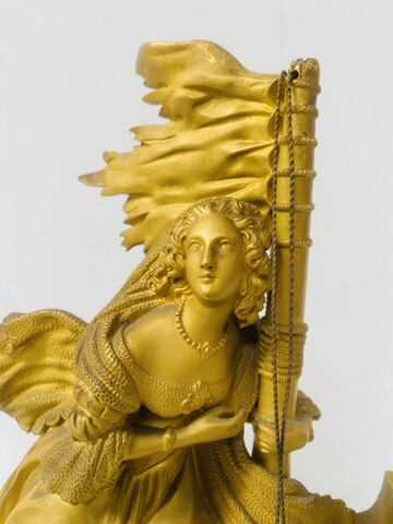 pendule romantique de cheminée en bronze doré thème tempête en mer .XIX siècle.