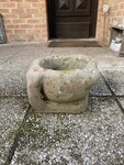 pilon mortier en pierre finement sculpté comportant anse . XVIII siècle .