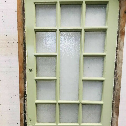 Porte de service a petits carreaux et imposte vitrée XX siècle