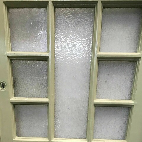 Porte de service a petits carreaux et imposte vitrée XX siècle