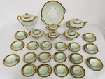 service à café et Thé comportant 25 pièces en porcelaine polychrome . XX siècle.