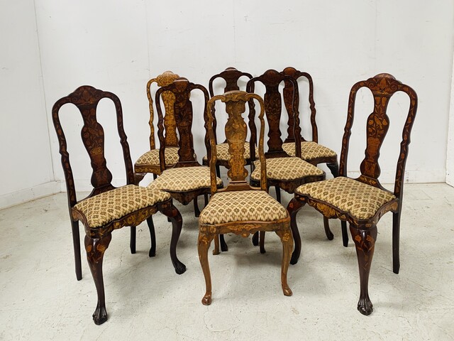 suite de huit chaises en bois marqueté de masques oiseaux vases . XIX siècle .