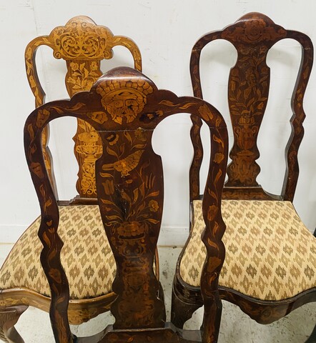 suite de huit chaises en bois marqueté de masques oiseaux vases . XIX siècle .