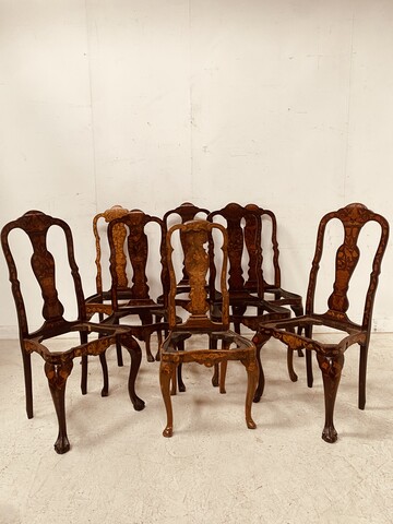suite de huit chaises en bois marqueté de masques oiseaux vases . XIX siècle .