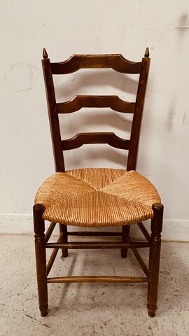 suite de six chaises assises paille en bois teinté merisier . XX siècle .