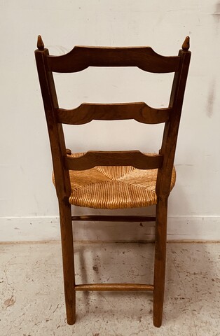 suite de six chaises assises paille en bois teinté merisier . XX siècle .