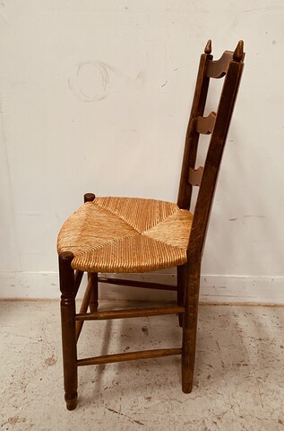 suite de six chaises assises paille en bois teinté merisier . XX siècle .