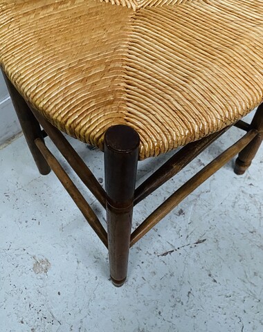 suite de six chaises assises paille en bois teinté merisier . XX siècle .