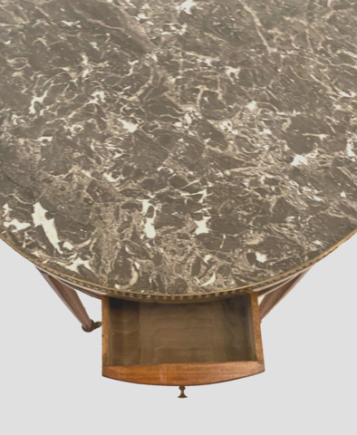 Table bouillote de style Louis XVI en acajou dessus marbre gris SA . XX siècle .